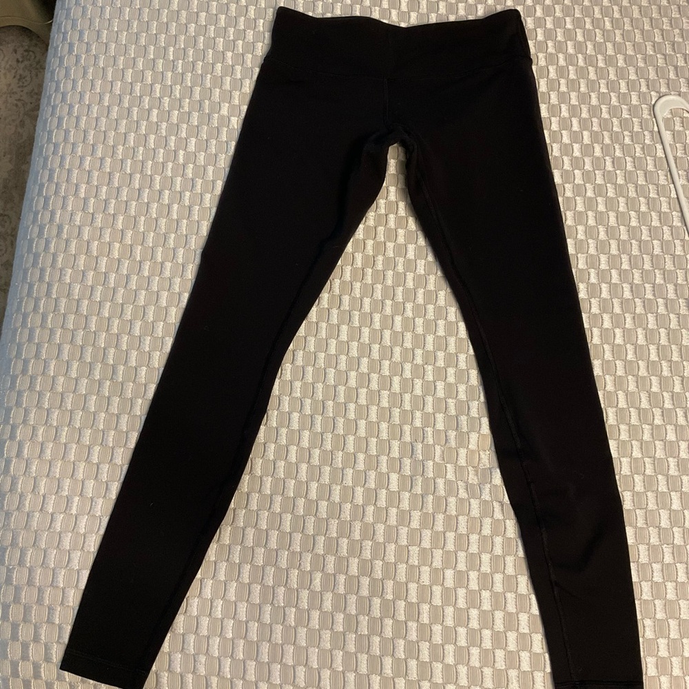 Lululemon black wunder under tights, size 8